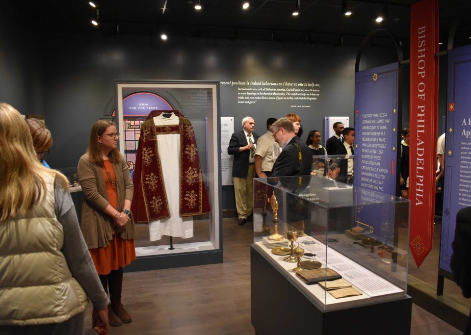 People Looking At Artifacts At The National Shrine Of St John Neumann Church And Museum